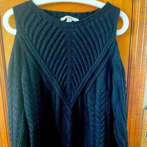 Cute cable knit off the shoulder sweater in black.